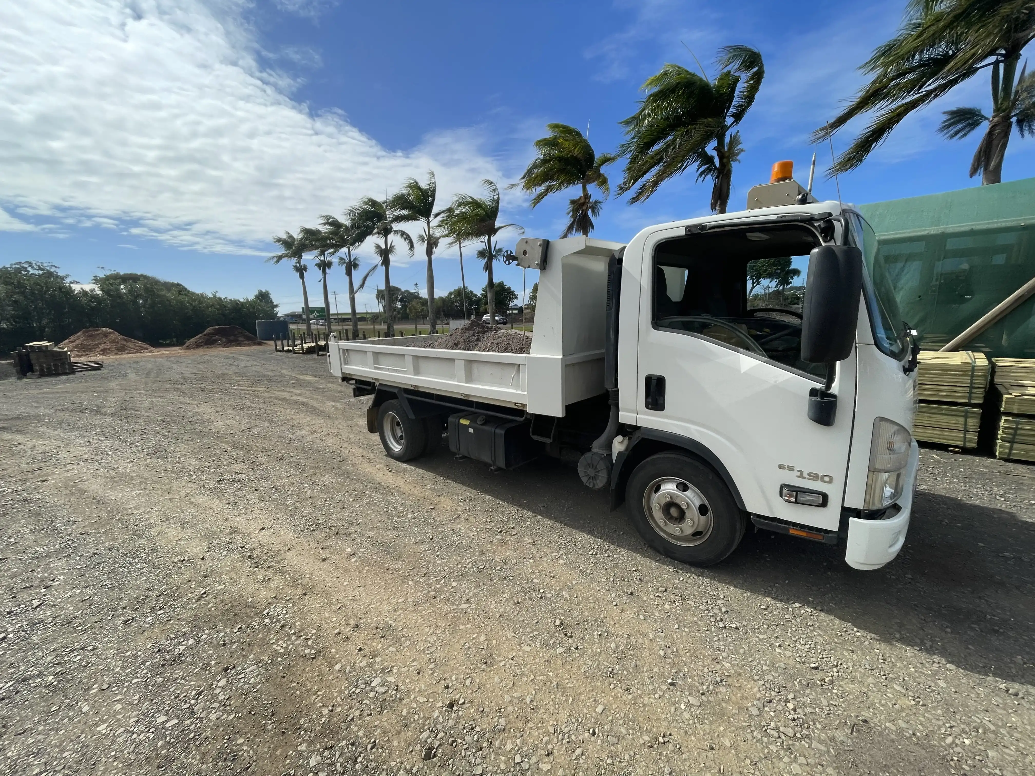 Bundy Dingo crew preparing a Bundaberg residential driveway
